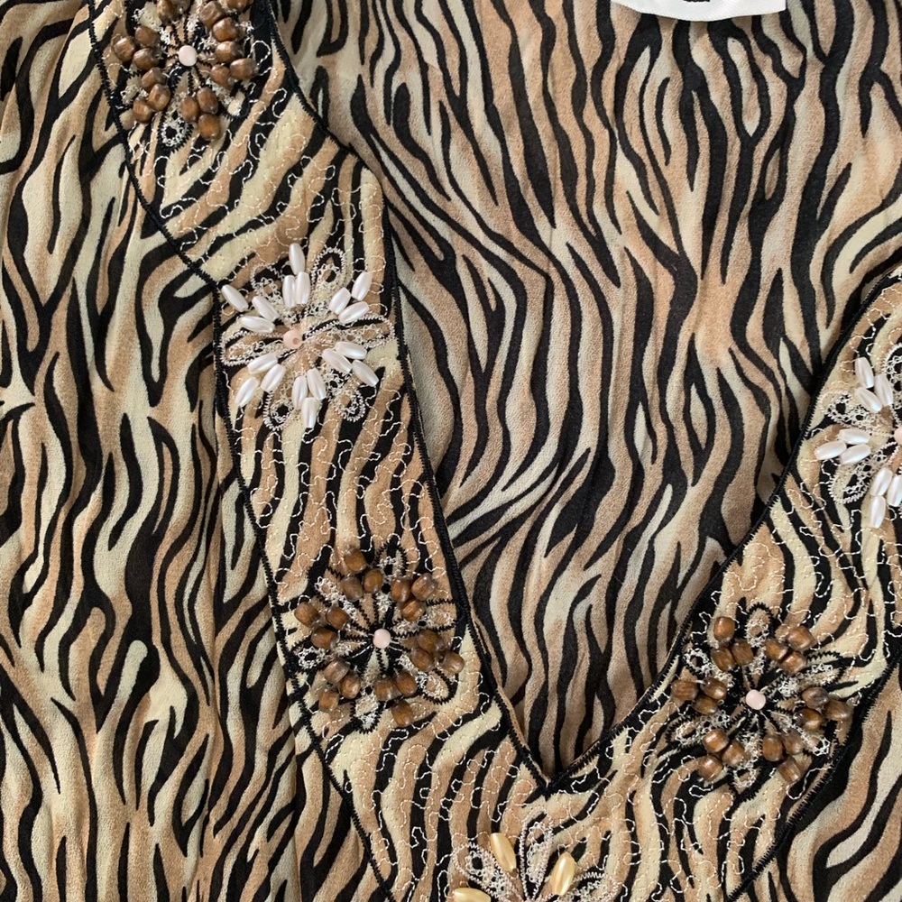 Animal print blouse by Cato size S